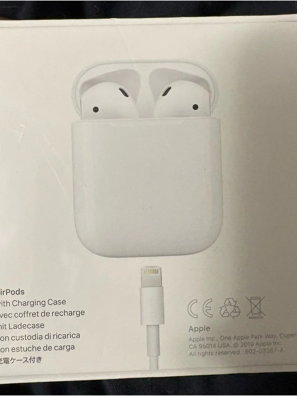 Apple air pods with charging case. Never opened